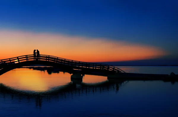 A quiet moment together, above the waters of Lefkada, where love meets nature